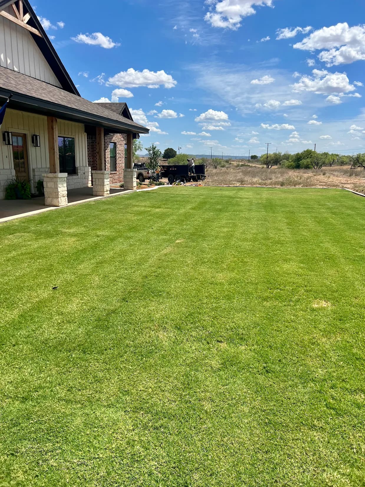 Healthy green lawn with broad, even coverage at a West Texas property